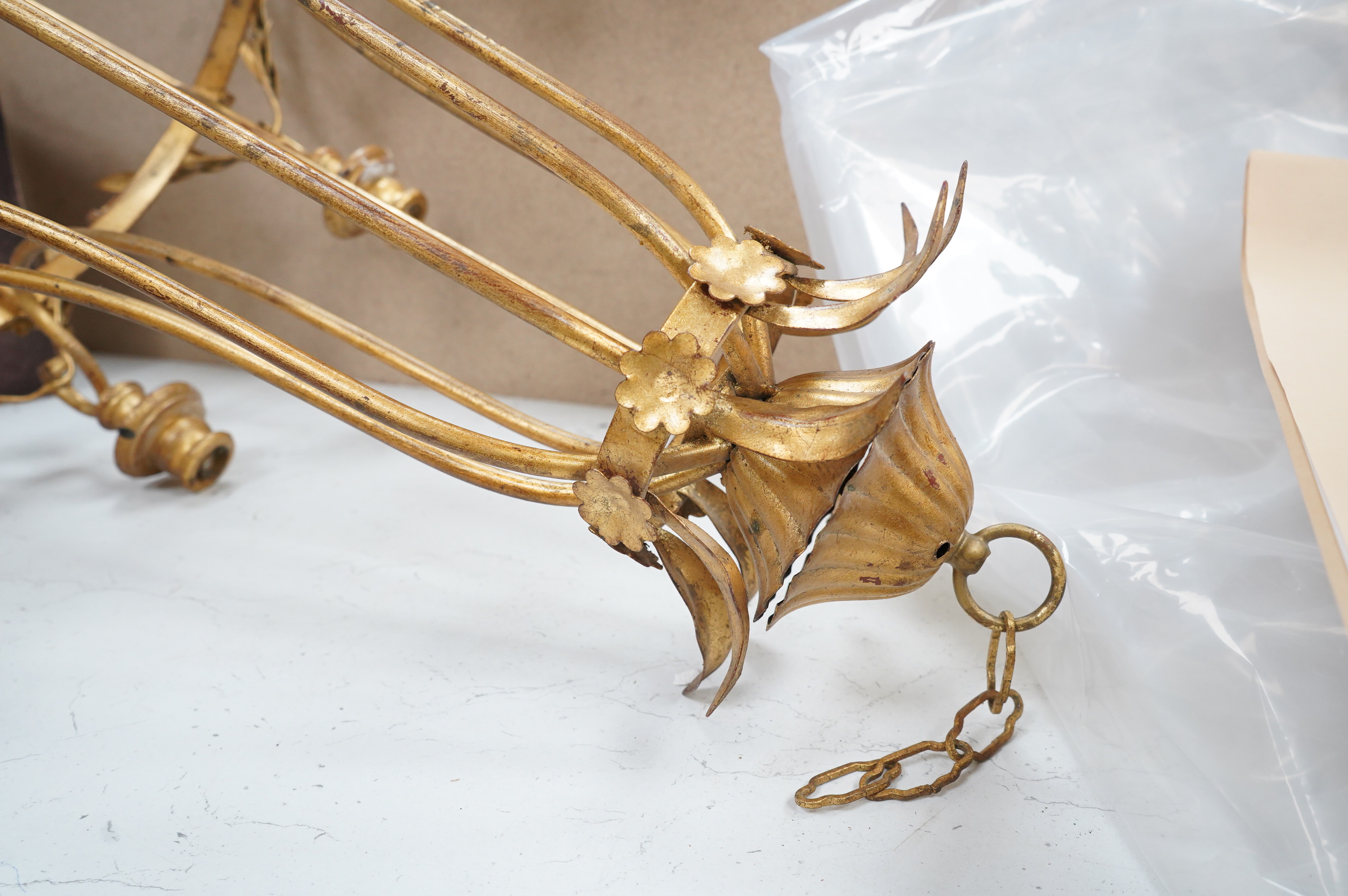 A gilt metal eight light basket chandelier, 86cm